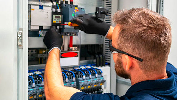 man working on electrical